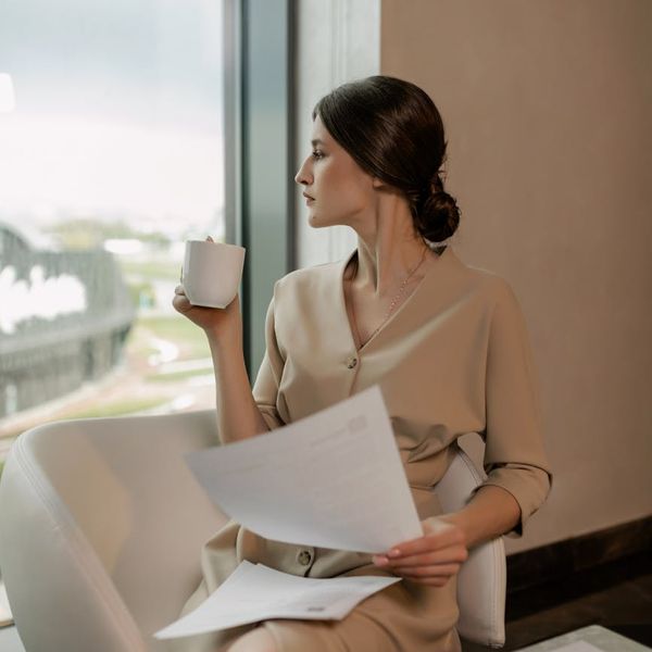 Person in a professional setting looking calm and focused.